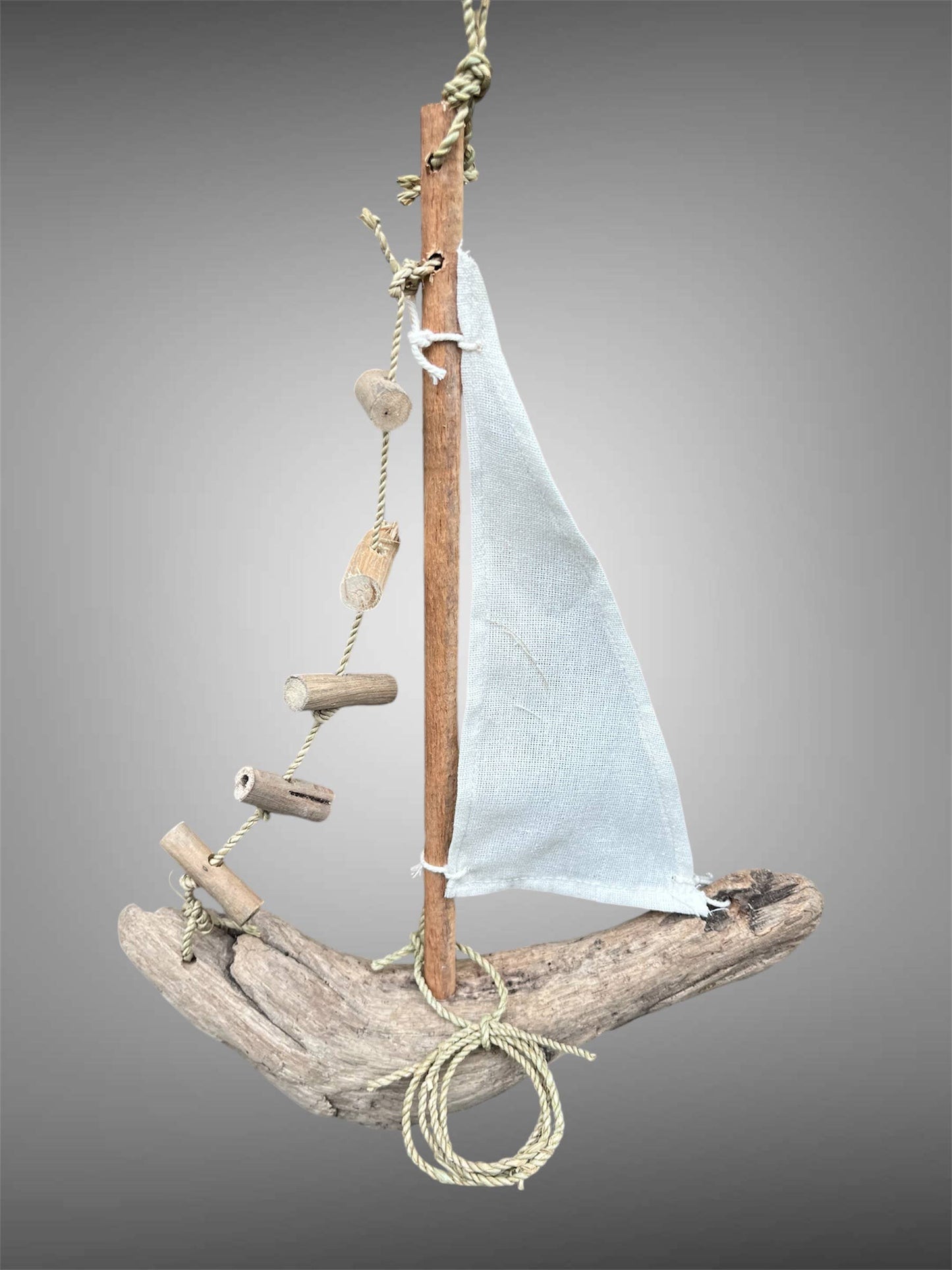 Hanging driftwood boat mobile. 